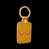 Porte-clés Boobs En Cuir - Moutarde-Ark Online